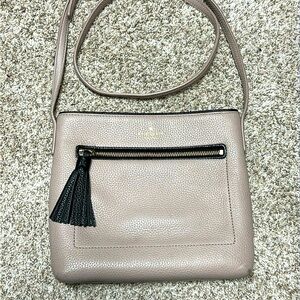 Kate Spade full grain leather Crossbody with black leather accents and tassel
